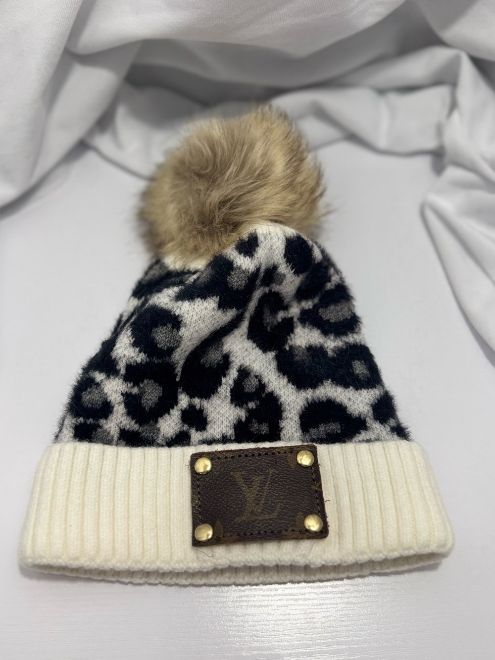 Monogrammed leather patch Black & White Leopard Knit Beanie with Cream Cuff